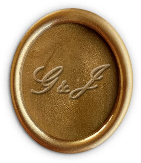 Sello de cera de oro viejo con el monograma G & J